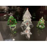 Three Swarovski crystal Christmas Trees together with a Clown, all boxed (4)