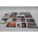Stamps selection of GB Presentation Packs and FDCs, kilowear and a framed sheet
