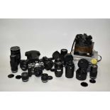 Group of cameras and lenses including Nikon, Olympus etc