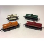 Railway O gauge tin plate Pratts (x2), Esso and Shell tank wagons, LMS fish van & wagon, two tenders