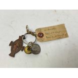 Boer War interest- button, coin and fob with attached label "from Augustus V. Hamilton of Lord Alwyn