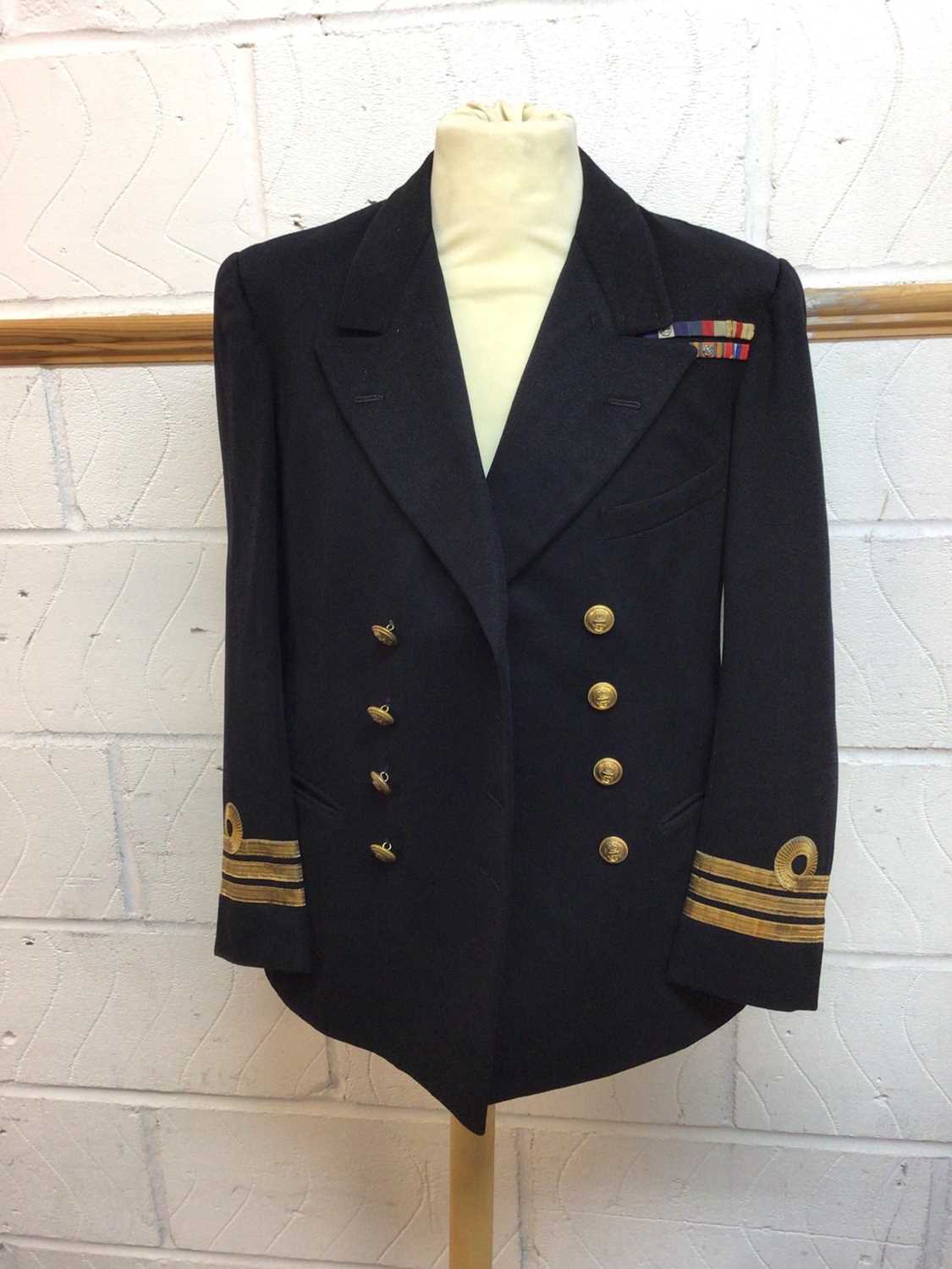 Royal Navy Commanders Service dress jacket with mounted medal ribbons for Distinguished Service Cros