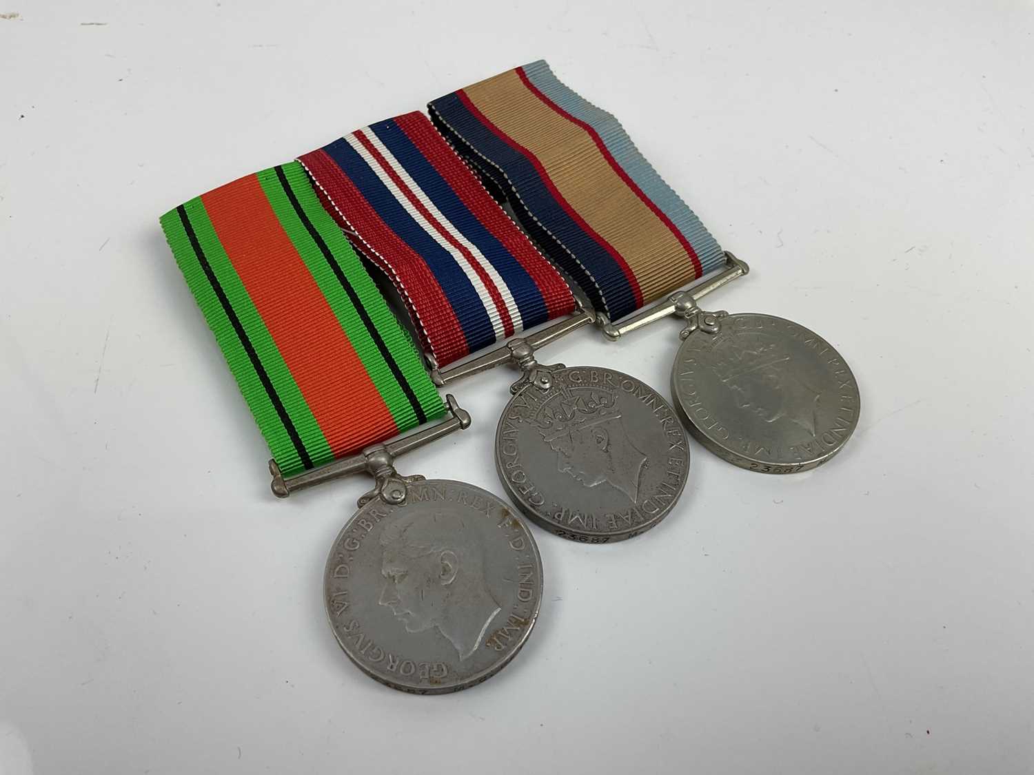 Second World War Australian medal trio comprising Defence and War medals together with Australia Ser