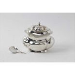 Edwardian silver tea caddy of lobed form with hinged cover and silver caddy spoon
