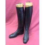 Pair of ladies black leather riding boots with wooden trees
