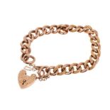 Edwardian 9ct rose gold curb link bracelet with alternating engraved and polished links with an engr