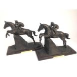 Harriet Glen, contemporary, pair of bronzed resin sculptures of jockeys on racehorses, each with pre