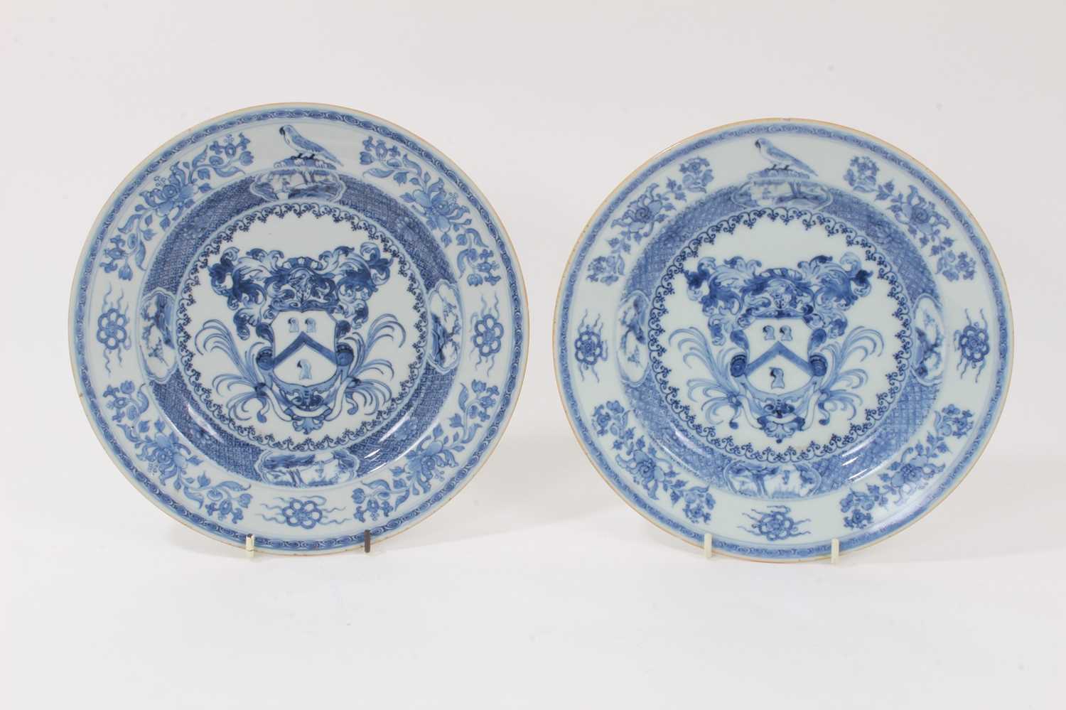 A rare pair of Chinese blue and white armorial plates, circa 1730