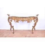 French-style giltwood console table with shaped mirrored top