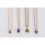 Four gold and diamond and gem-set pendants on 9ct gold chains
