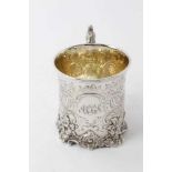 Good quality Victorian silver christening mug with ornate rococo cast borders, engraved decoration a