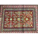 Small tribal rug, with angular ornament on brick red ground, 80 x 67cm, together with three other va