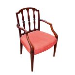 George III mahogany open armchair, in the Sheraton style, with arched vertical slat back and stuff o