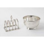 Plain silver sugar bowl raised on circular foot, (London 1930), approx 5.5ozs and silver toast rack,