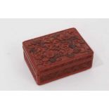 Chinese cinnabar lacquer box of rectangular form with floral decoration, 7.5cm in length.