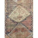Persian rug, with four serrated conjoined medallions in multiple geometric borders, 260 x 153cm, tog