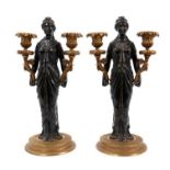 Pair of early 19th century French bronze candlesticks