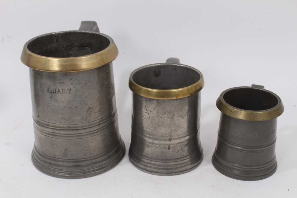 Collection of pewter: Three brass rimmed tankards, one marked 'Battle of The Nile' Rotherhythe, two - Image 2 of 5