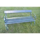 Antique cast iron garden bench, with slat back and seat and scroll ends, 154cm long