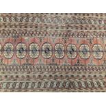 Tekke Turkoman rug, with single row of ten quartered medallions in multiple geometric borders, 162 x