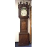 Victorian eight-day longcase clock with arched painted dial with landscape to arch in broad mahogany