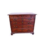 Mid 18th century oak chest of small size, with four short drawers over four long graduated drawers o