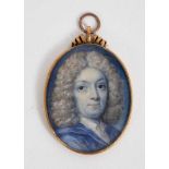 English School, early 18th century, watercolour miniature portrait on ivory, a gentleman with powder