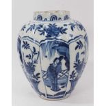18th/19th century tin glazed pottery vase of reeded ovoid form painted segmented panels with figures