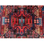 Persian rug on blue and red ground
