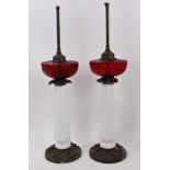 Pair of Victorian opaline and ruby glass and metal mounted table lamps