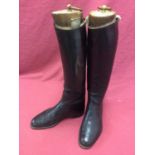 Pair of black leather hunting boots with wooden trees by Maxwell of London