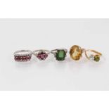 Group of five gem-set dress rings to include a green tourmaline and diamond ring.