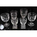 A group of six 19th century glasses, including a pair of large goblets engraved with hops and barley