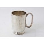 Silver tankard of plain form with loop handle on circular foot, (Birmingham 1924), 13cm high, 12ozs