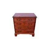 19th century mahogany four drawer chest of small size, the graduated drawers with original brass fit