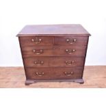Early George III mahogany chest of drawers, raised on cut down ogee feet