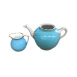 A Worcester turquoise ground teapot, circa 1770, and a turquoise ground small cream jug