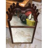 Wooden framed wall mirror, with decorative fret mount, 75 cm high x 41 cm wide