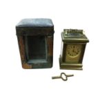 Brass cased carriage clock of small proportions, in original case