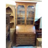Georgian style burr walnut two height bureau bookcase, with two glazed doors, fitted writing compart