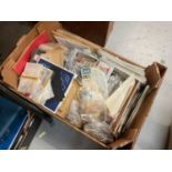 Two boxes of stamps, loose and in albums