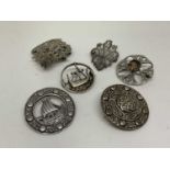 Scottish Iona sterling silver brooch, three other silver brooches and similar