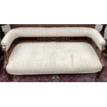 Edwardian mahogany sofa, with pad upholstered back and seat raised on pierced supports and reeded sq