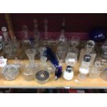 Selection of glass ware including decanters, oil lamp and various ornaments (1 shelf)