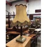 A brass Corinthian style column table lamp, with shade