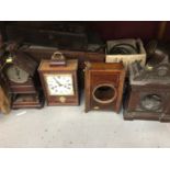 Collection of antique clocks and clock cases including movements and parts for restoration