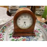 Edwardian bedroom clock in burr walnut veneered case.