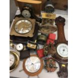 Group of vintage clocks and barometers