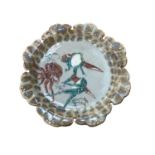 Unusual Japanese celadon glazed pottery plate depicting Toads and an Octopus.