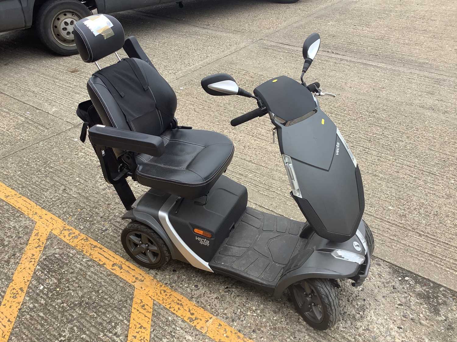 Rascal Vecta Sport mobility scooter together with Key and charger